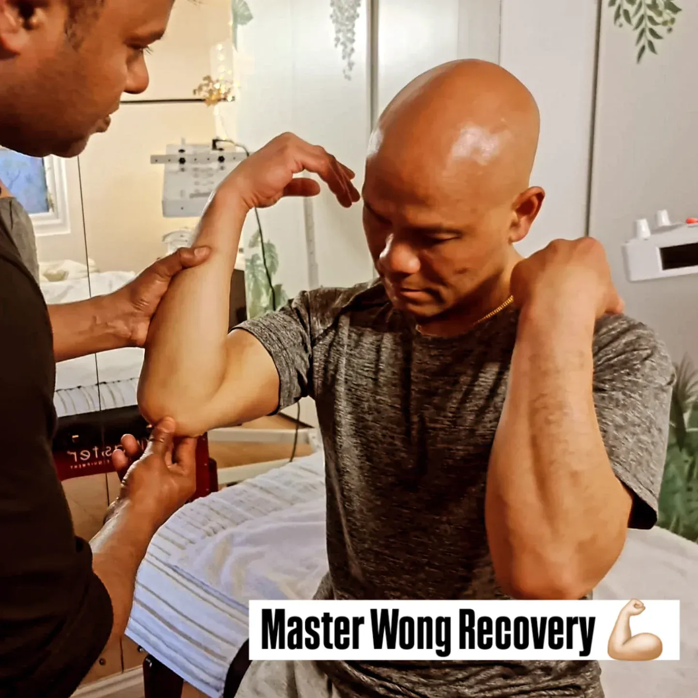 Hope House Recovery practitioner supporting a client during posture and movement work